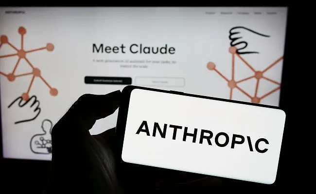 Anthropic and Claude branding displayed on screens