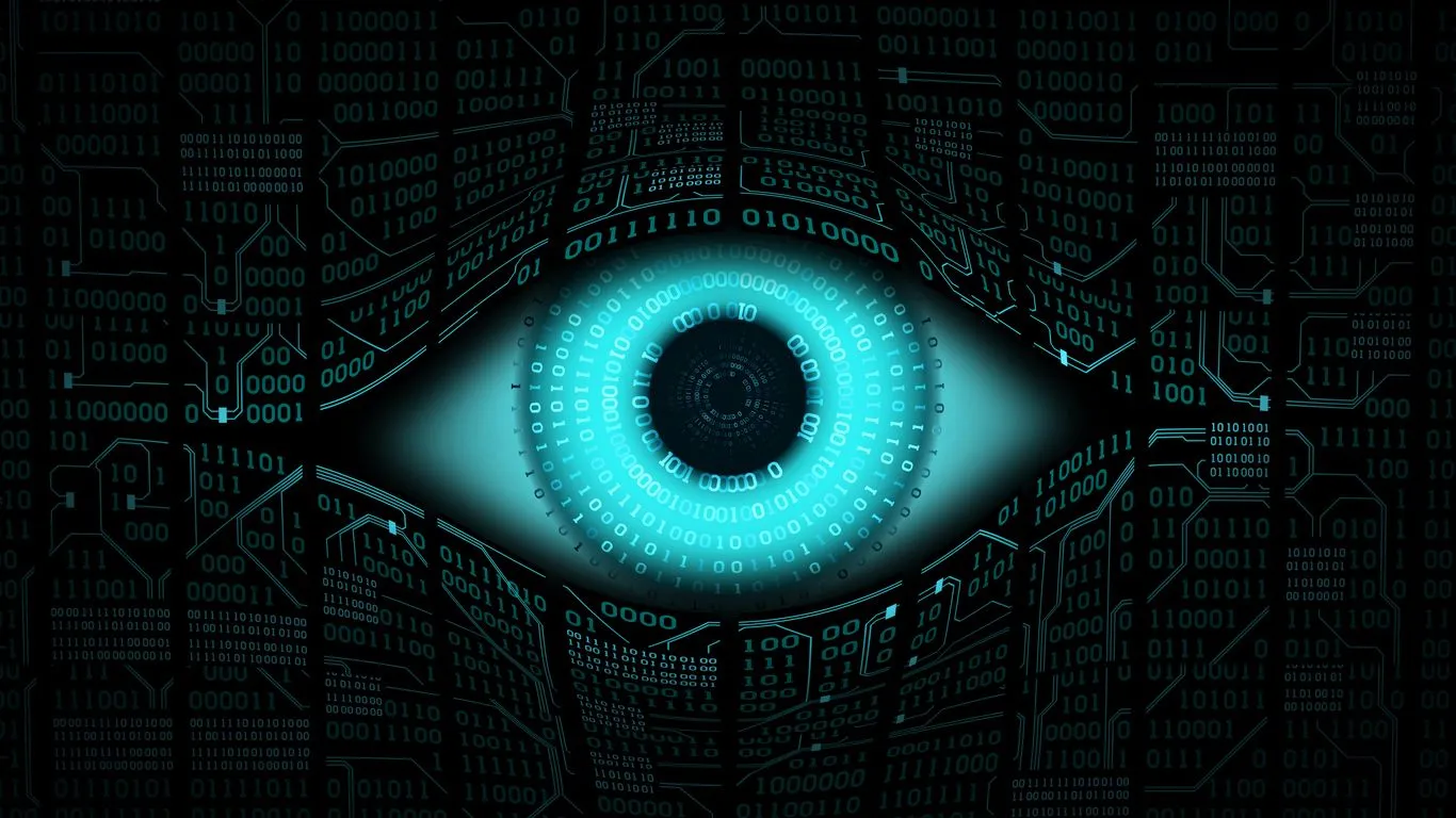 A blue eye surrounded by digital circuitry