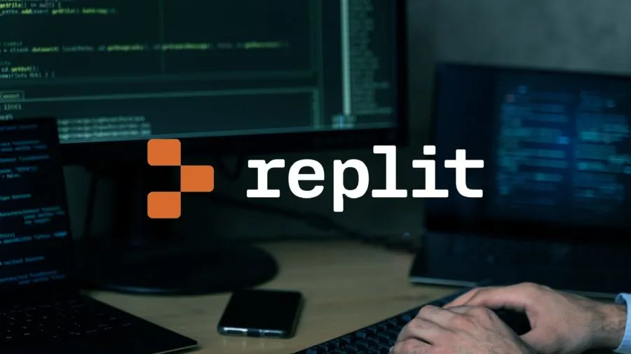 Replit branding in front of computer screens